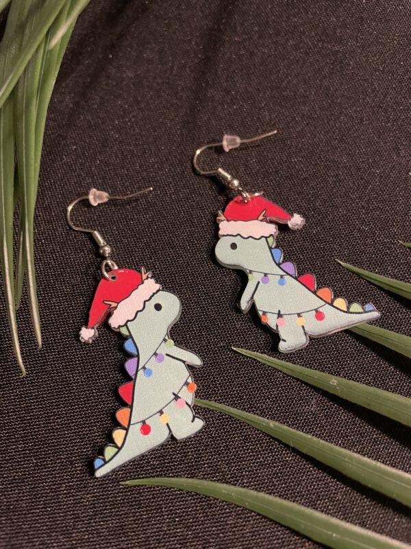 Feestelijke Kerst Dino Zilverkleurige hangende oorbellen